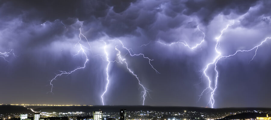 Massive Lightning Strikes From an Intense Summer Thunderstorm dwarfs the city of Pretoria, Gauteng Province, South Africa